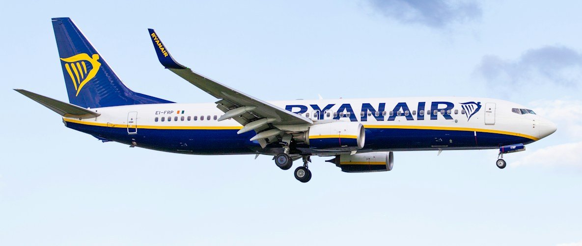white and blue plane